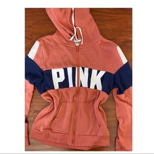 Pink zip up sweater. Worn once.